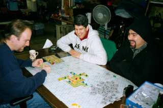 Dave, Paul, and Val enjoy some Carcassone
